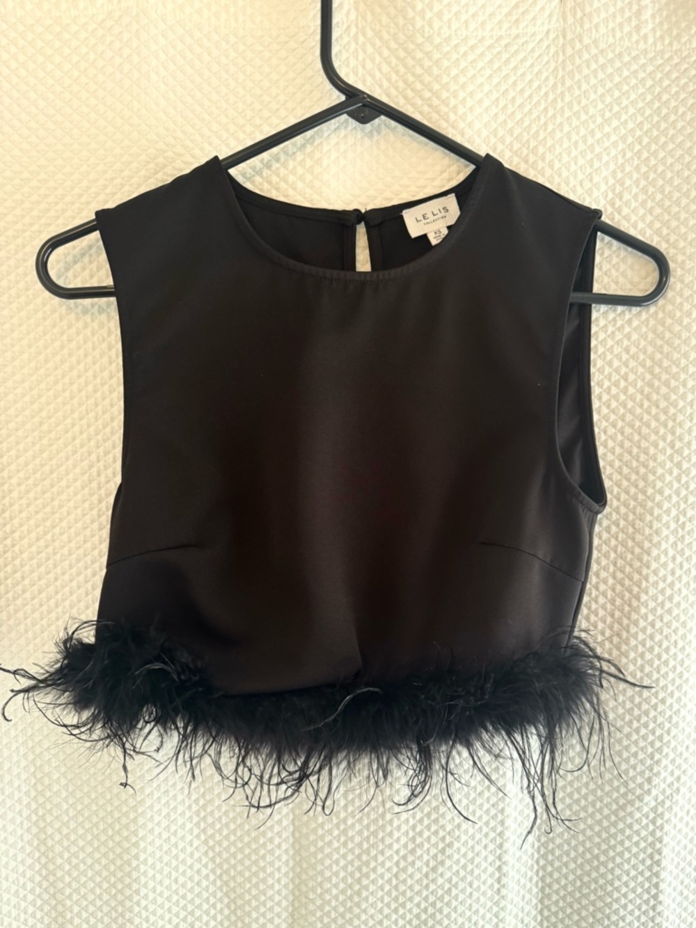 Cropped black top with feather bottom